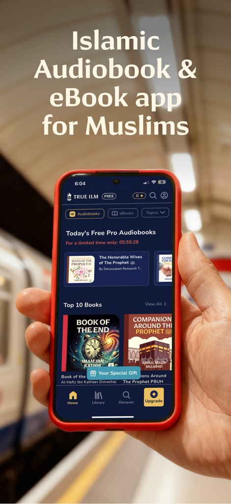 True Ilm: Audiobooks & eBooks - A person holding a smartphone showing the True Ilm app interface with Islamic audiobooks and eBooks during a commute.
