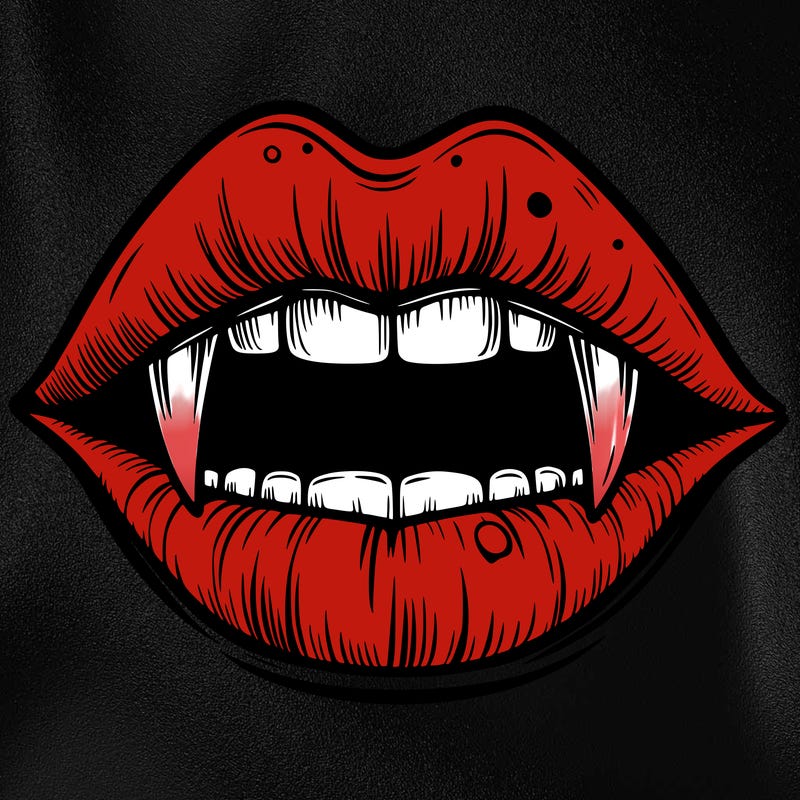 lips with vampire teeth