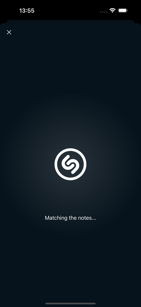 Tunefind - Tunefind-App-Songerkennungs-Oberfläche mit der Nachricht, die Noten abgleicht