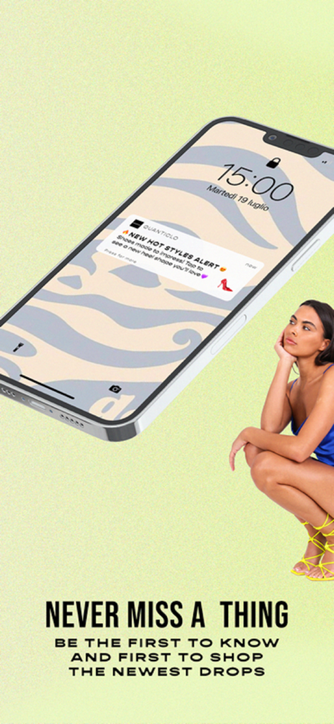 Un smartphone mostrando una notificación push de la app Quanticlo sobre alertas de nuevos estilos de calzado