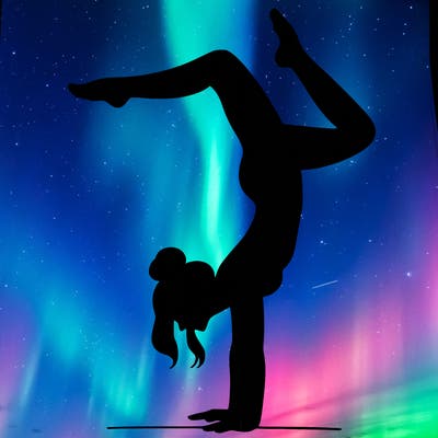 a woman doing a handstand