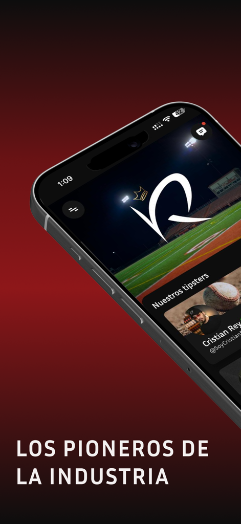 Mobile phone screen displaying the Los Reyes sports betting app interface and the slogan Industry Pioneers in Spanish