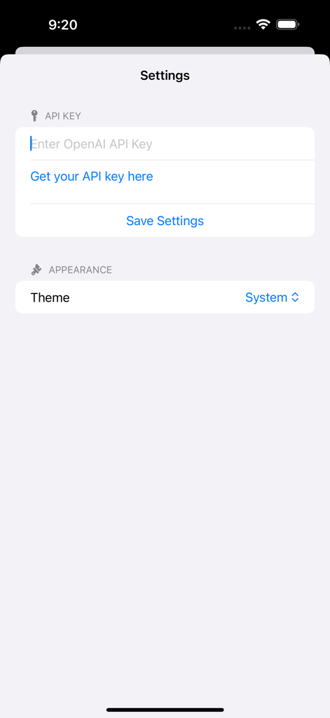 OpenAssistant - Settings screen of the OpenAssistant app with a field to enter an OpenAI API key and theme selection options.