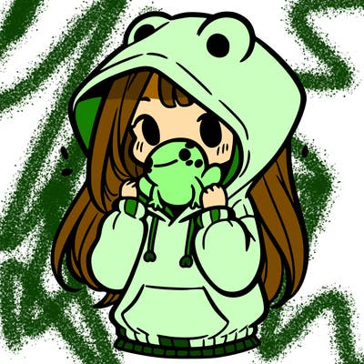 a girl holding a froggy hoodie