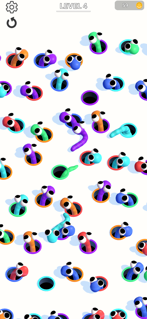 Hole Worm - Gameplay screenshot of Hole Worm showing colorful worms matching with colored holes