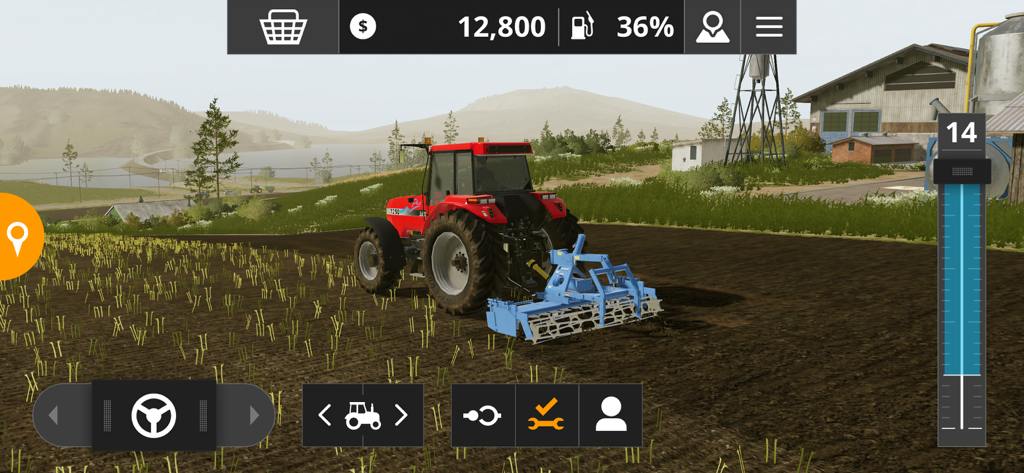 Farming Simulator 20 - A red tractor plowing a brown field in the Farming Simulator 20 game