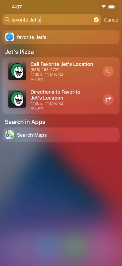 Resultados de pesquisa do iOS para Jets Pizza mostrando atalhos de chamada rápida e direções para um local de loja favorito.