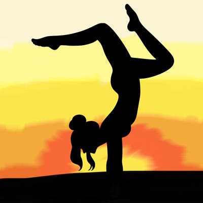 a woman doing a handstand