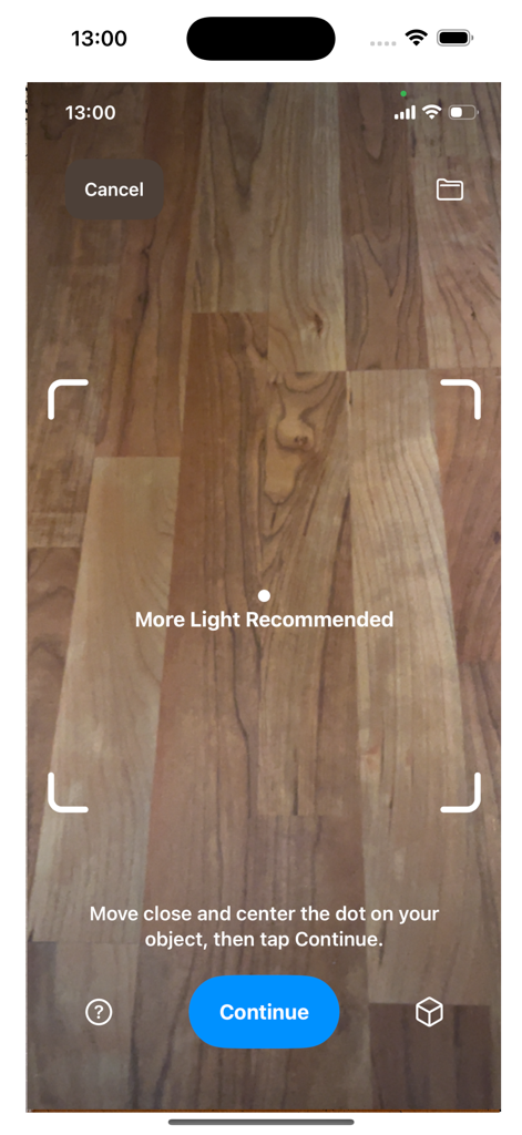 scanbust 3D - Schermata dell'interfaccia di acquisizione guidata dell'app ScanBust 3D che mostra la visuale della fotocamera con raccomandazioni sull'illuminazione