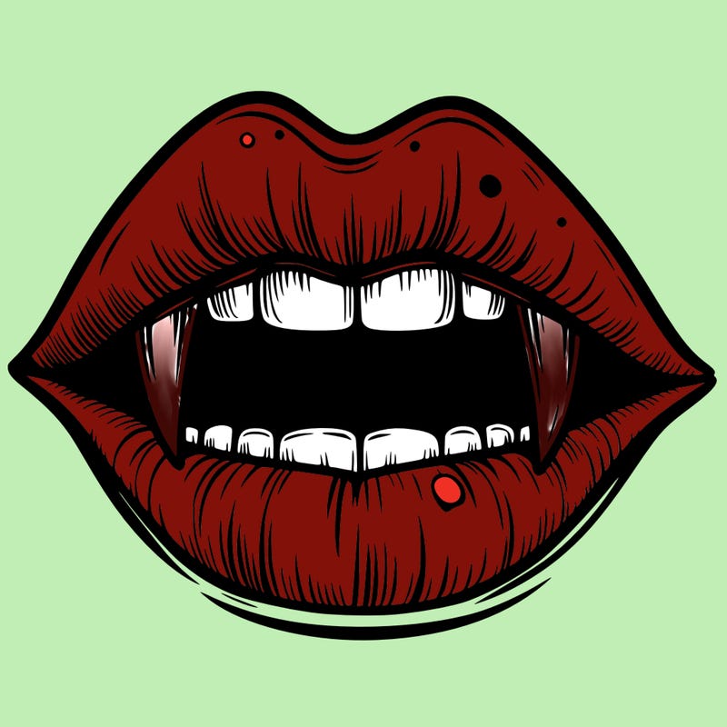 lips with vampire teeth