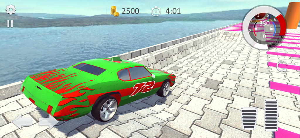A green muscle car with red flame decals on a stunt track overlooking the ocean