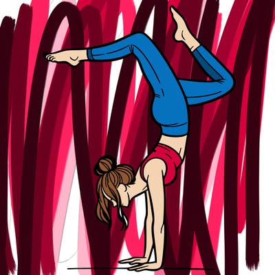 a woman doing a handstand