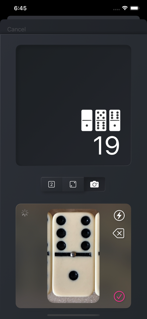 Dominotes - Dominotes app camera interface scanning a physical domino tile to automatically count points and update the score
