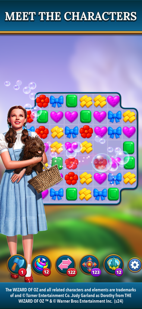 The Wizard of Oz Magic Match 3 - Dorothy Gale holding Toto next to a colorful Match 3 puzzle board
