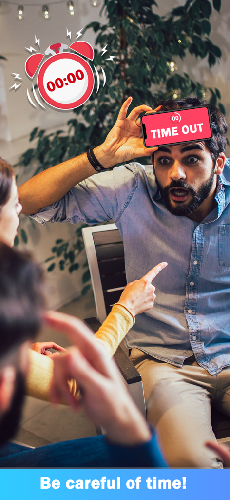 Party Charades: Guessing Game - A man playing the party charades game with a phone on his forehead showing a time out message during a social gathering