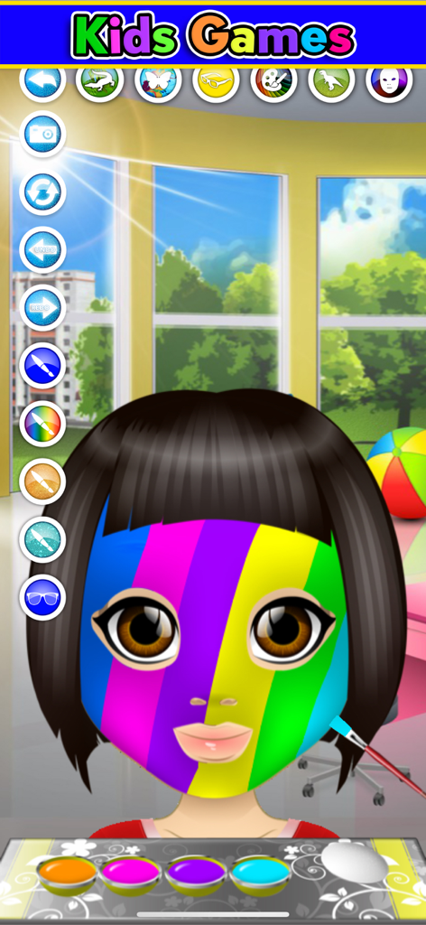 Kids Face Paint: Coloring Game - Captura de pantalla del juego que muestra a un personaje infantil con rayas de arcoíris pintadas en la cara en el juego Kids Face Paint