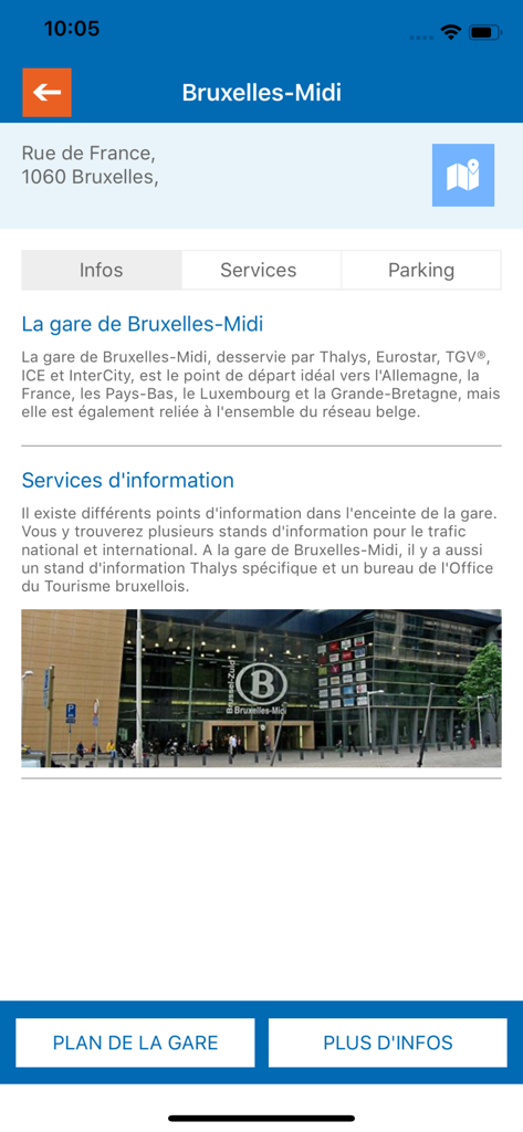 Pantalla de información para la estación de tren de Bruselas-Midi en la aplicación SNCB International que muestra la descripción de la estación y una foto exterior.