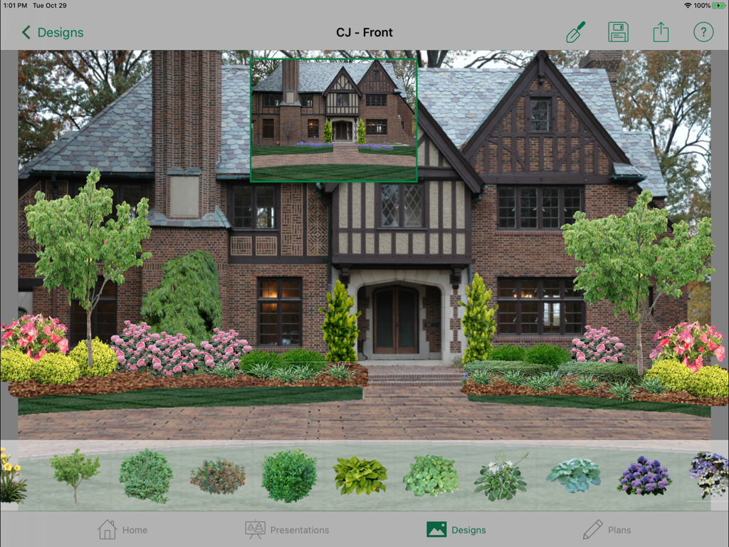A professional landscape design mockup on an iPad showing a house with digital plants and shrubs added using the PRO Landscape Companion app