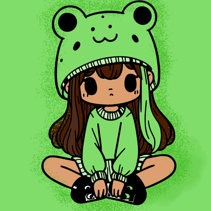a girl wearing a frog hat and some frog socks