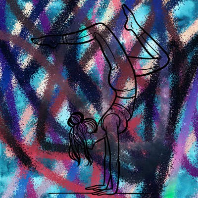 a woman doing a handstand