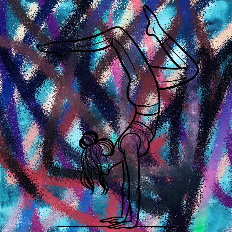 a woman doing a handstand