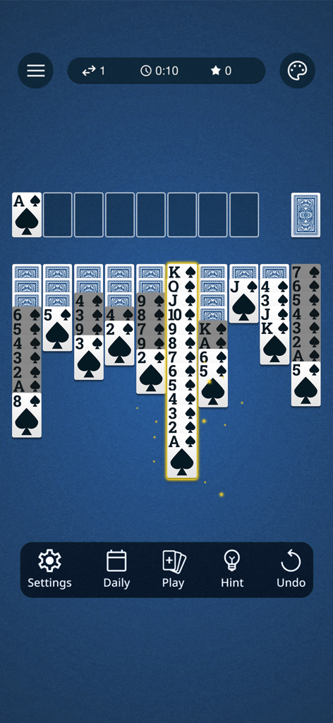 Spider Solitaire: Classic Card - In-game view of Spider Solitaire with a completed sequence of spades highlighted on a blue background