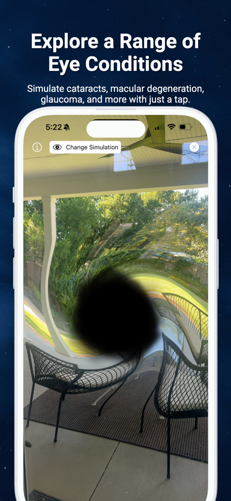 iPhone screen showing a real-time camera simulation of macular degeneration with a central blind spot over a patio scene