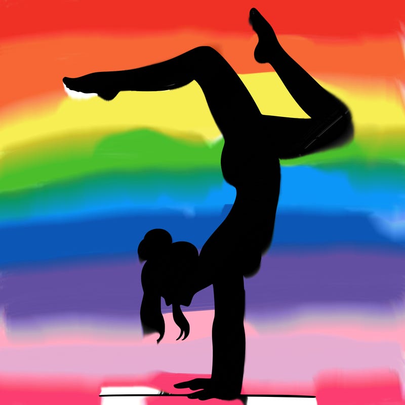 a woman doing a handstand