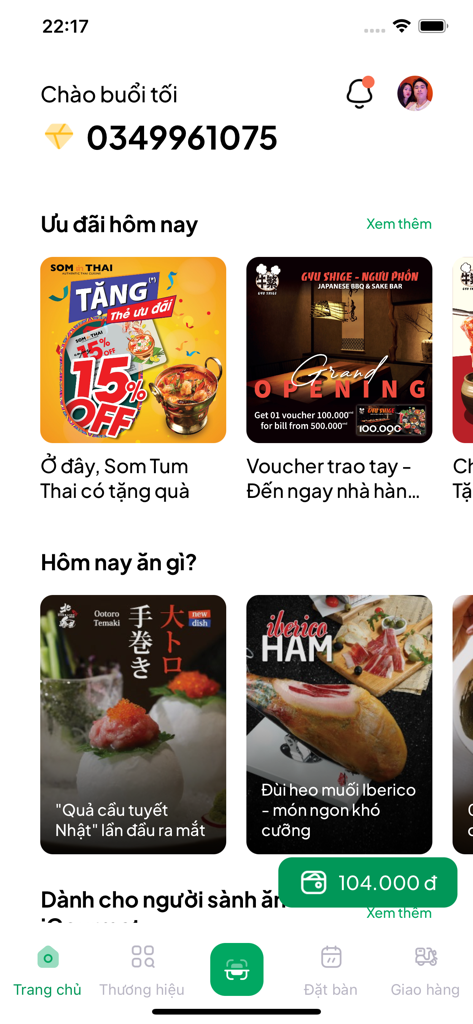 The home screen of the iGourmet app showing restaurant promotions food recommendations and a digital wallet balance