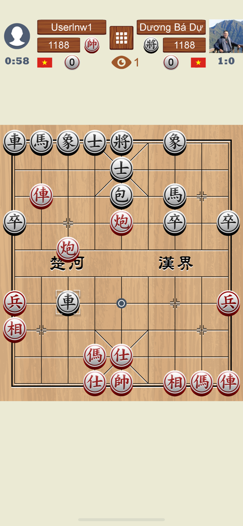 Chinese Chess Online - Xiangqi - Online Xiangqi match on a traditional wooden board with red and black pieces