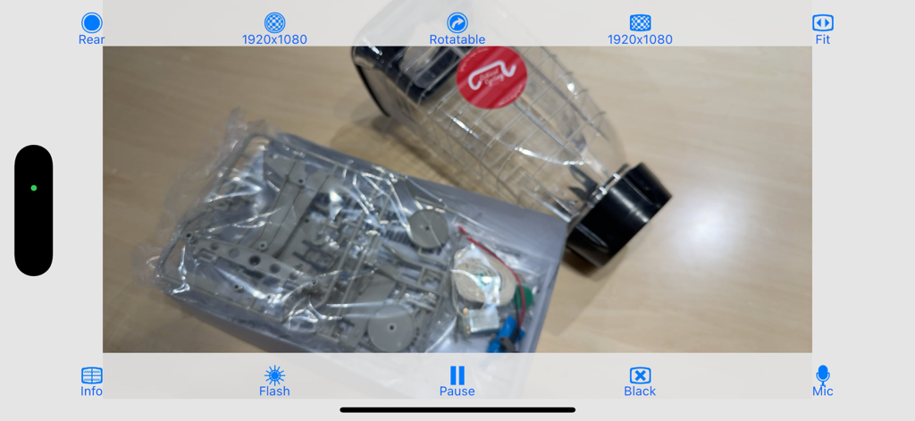 CameraVision - CameraVision mobile app interface showing a live camera feed of physical objects with presentation controls