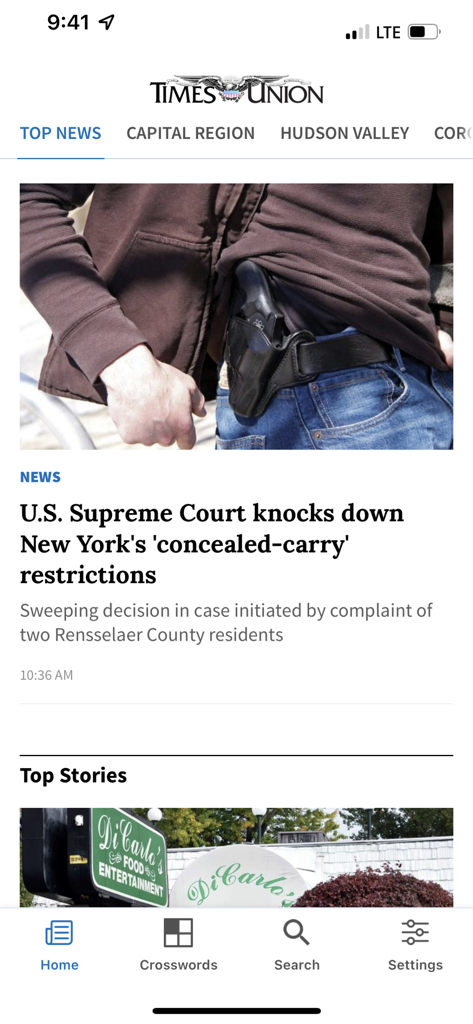 Times Union news app interface displaying a headline about the Supreme Court ruling on New York gun laws