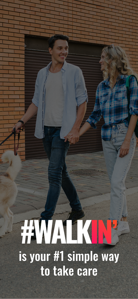 A happy couple walking their dog outdoors with a health and wellness slogan