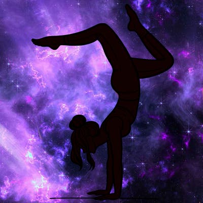 a woman doing a handstand