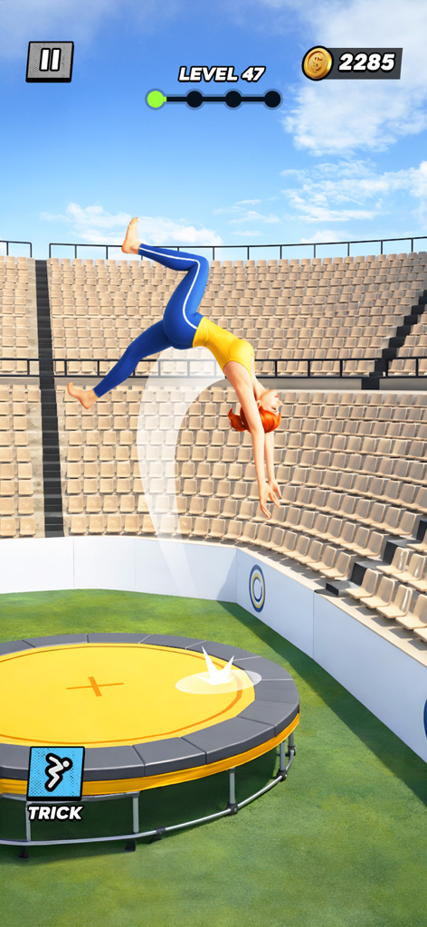 Backflip Mania - A character performing a backflip toward a yellow trampoline in a large stadium arena in Backflip Mania.