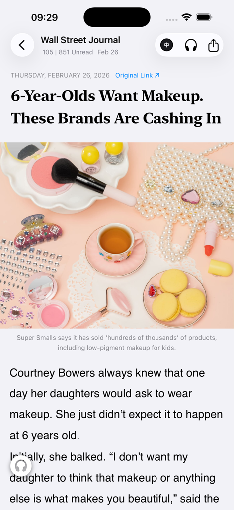 Screenshot of the ONews app displaying a Wall Street Journal article about children's makeup with an image of cosmetics and macarons.