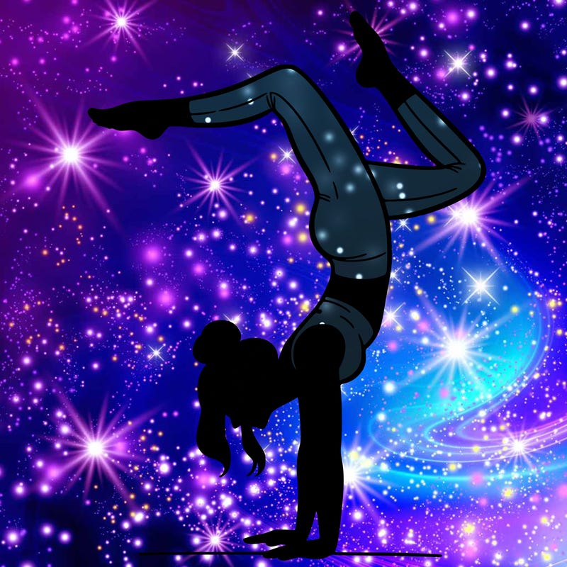 a woman doing a handstand