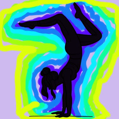 a woman doing a handstand
