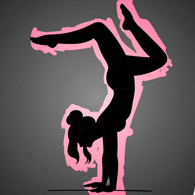 a woman doing a handstand