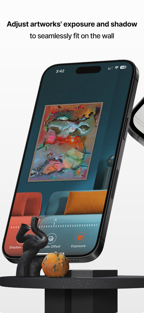 Smartphone screen showing the Artmywall app interface for adjusting artwork lighting and shadows on a wall mockup