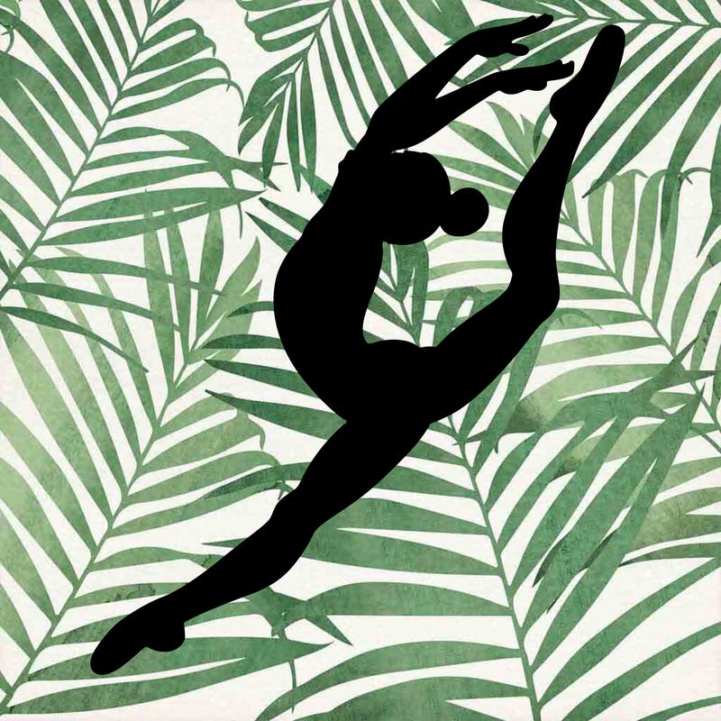 gymnast doing a leap in a leotard with a bent back leg