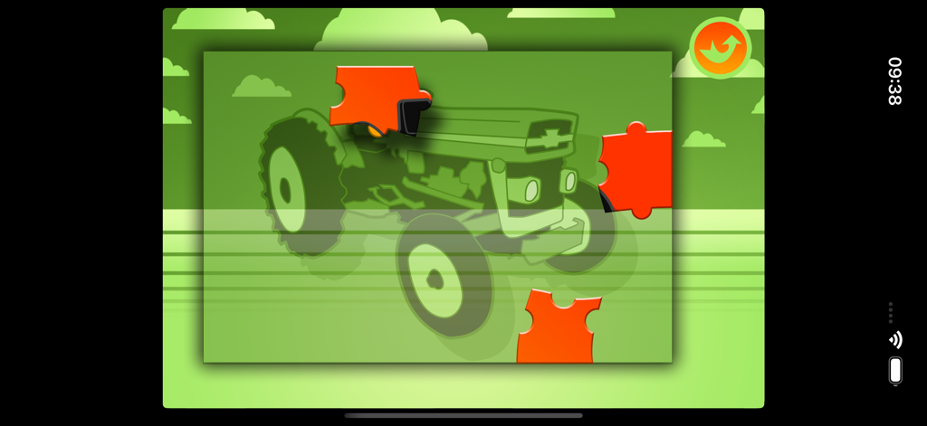 Un juego de rompecabezas para niños con un tractor agrícola verde