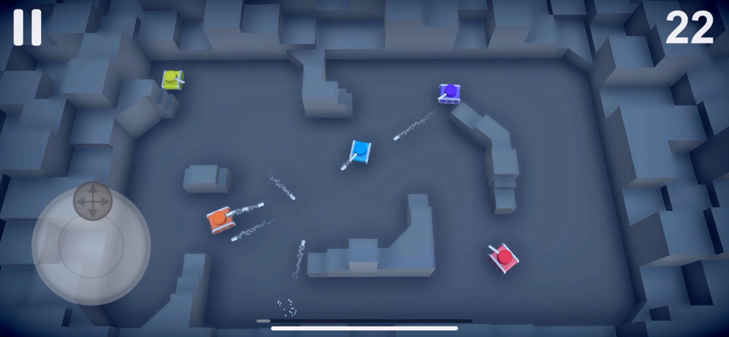 Top-down view of multiple colored tanks battling in a gray blocky arena with projectiles firing