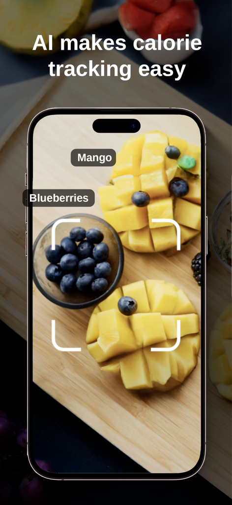 Easy Calorie AI app interface showing real-time food recognition of mango and blueberries through the camera lens