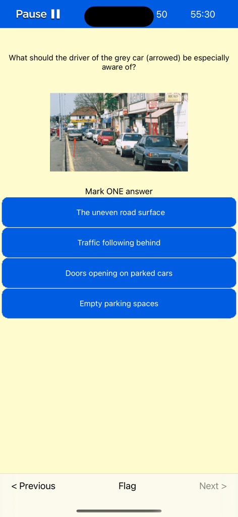 A screenshot from the Driving Theory Test 2025 app showing a multiple choice question with a street scene image and four answer options