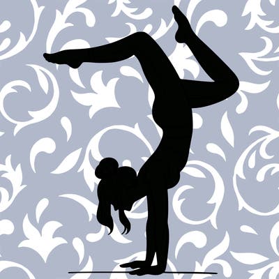 a woman doing a handstand