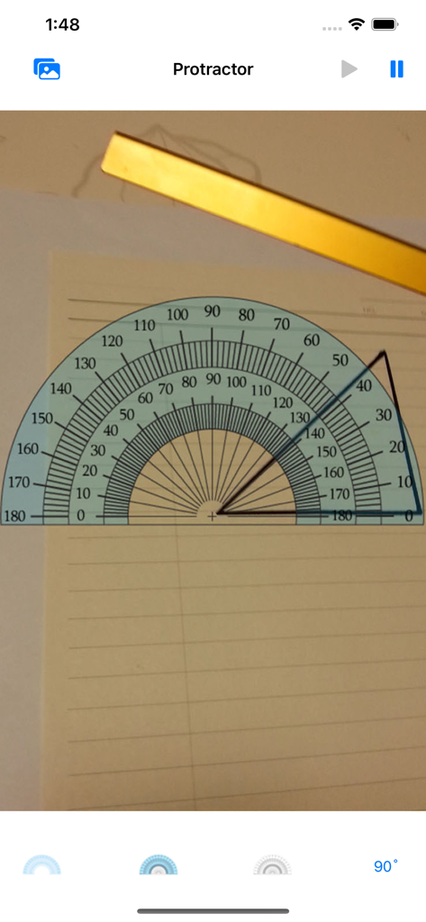 Protractor (Angle measurement) - Digital protractor overlay measuring a triangle angle on paper via phone camera