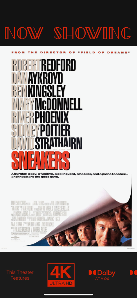 Now Showing – Movie Poster TV - Vertical home theater display showing the Sneakers movie poster with Now Showing header and 4K Ultra HD and Dolby Atmos icons.
