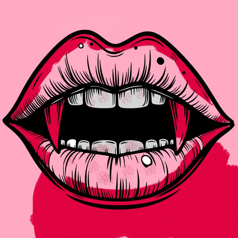 lips with vampire teeth