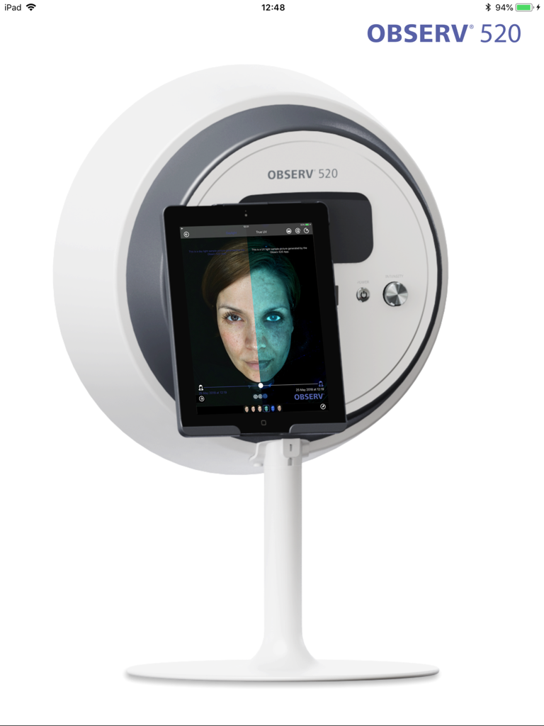 OBSERV 520 - OBSERV 520 professional skin analysis device with iPad displaying a split screen diagnostic scan